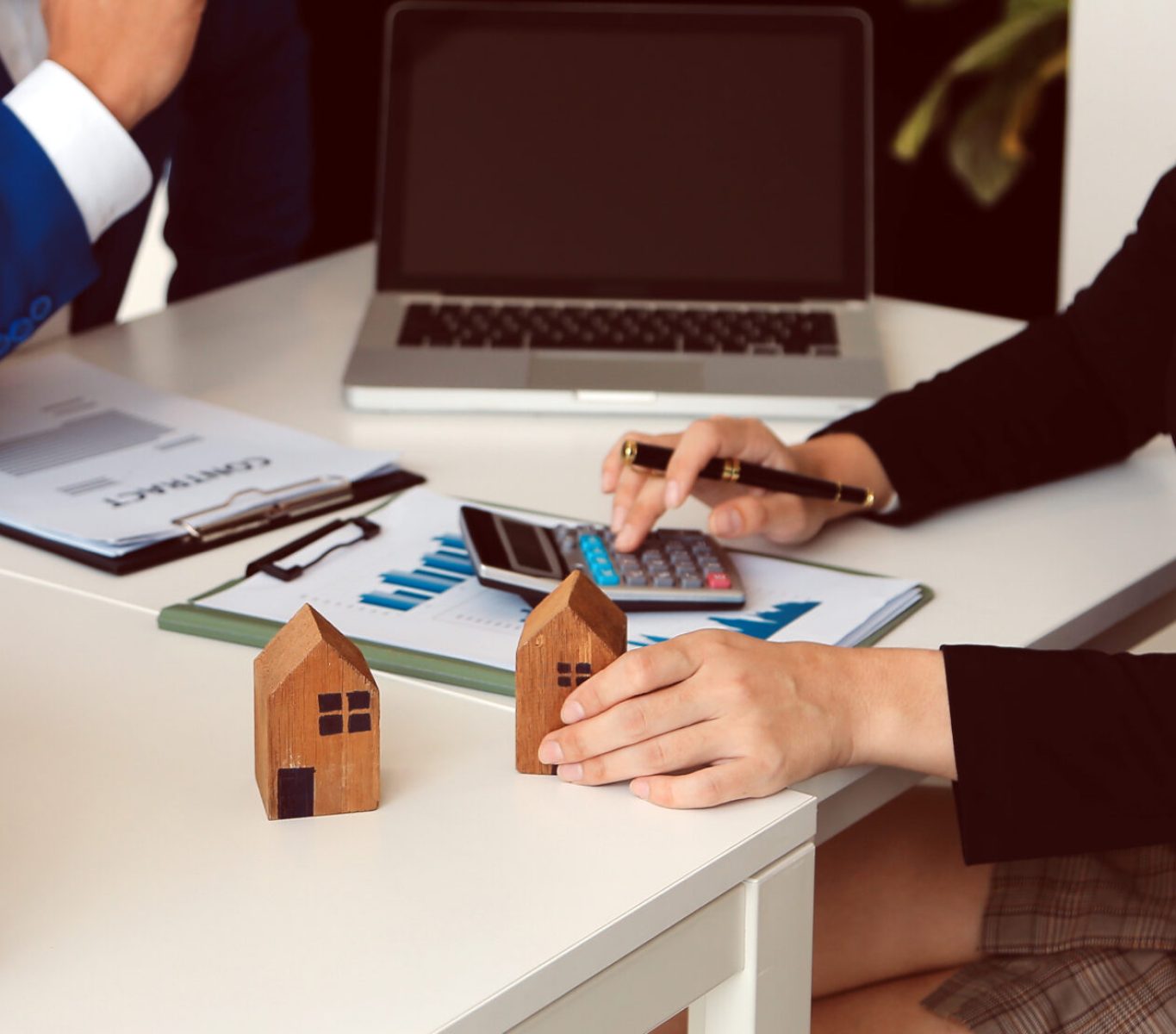 Female woman hands holding home model, small miniature white toy Female woman hands holding home model, small miniature white toy house. Mortgage property insurance dream moving home and real estate concept